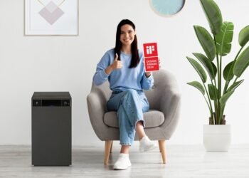 Smiling,millennial,woman,showing,empty,touch,pad,,gesturing,thumb,up,